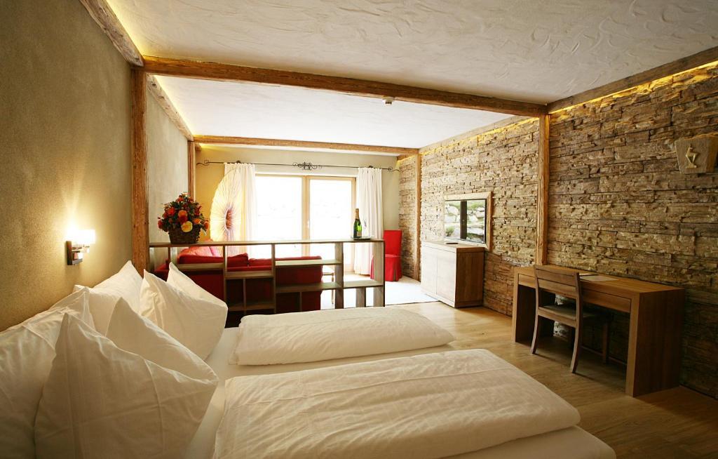 Hotel Rosis Sonnbergstuben Kitzbühel Habitación foto